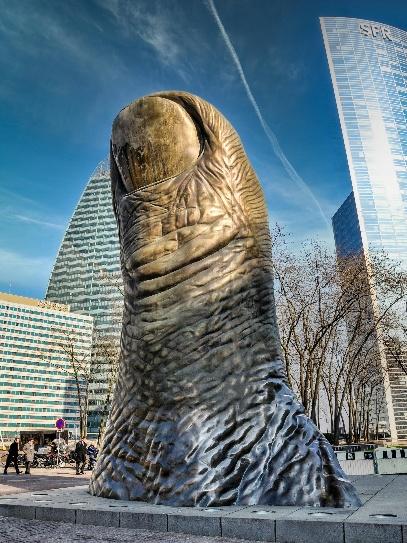 Photo of an oversized thumb sculpture in an urban setting, symbolizing the “rule of thumb” method often used in business valuations and quick financial assessments.
AI-generated content may be incorrect.